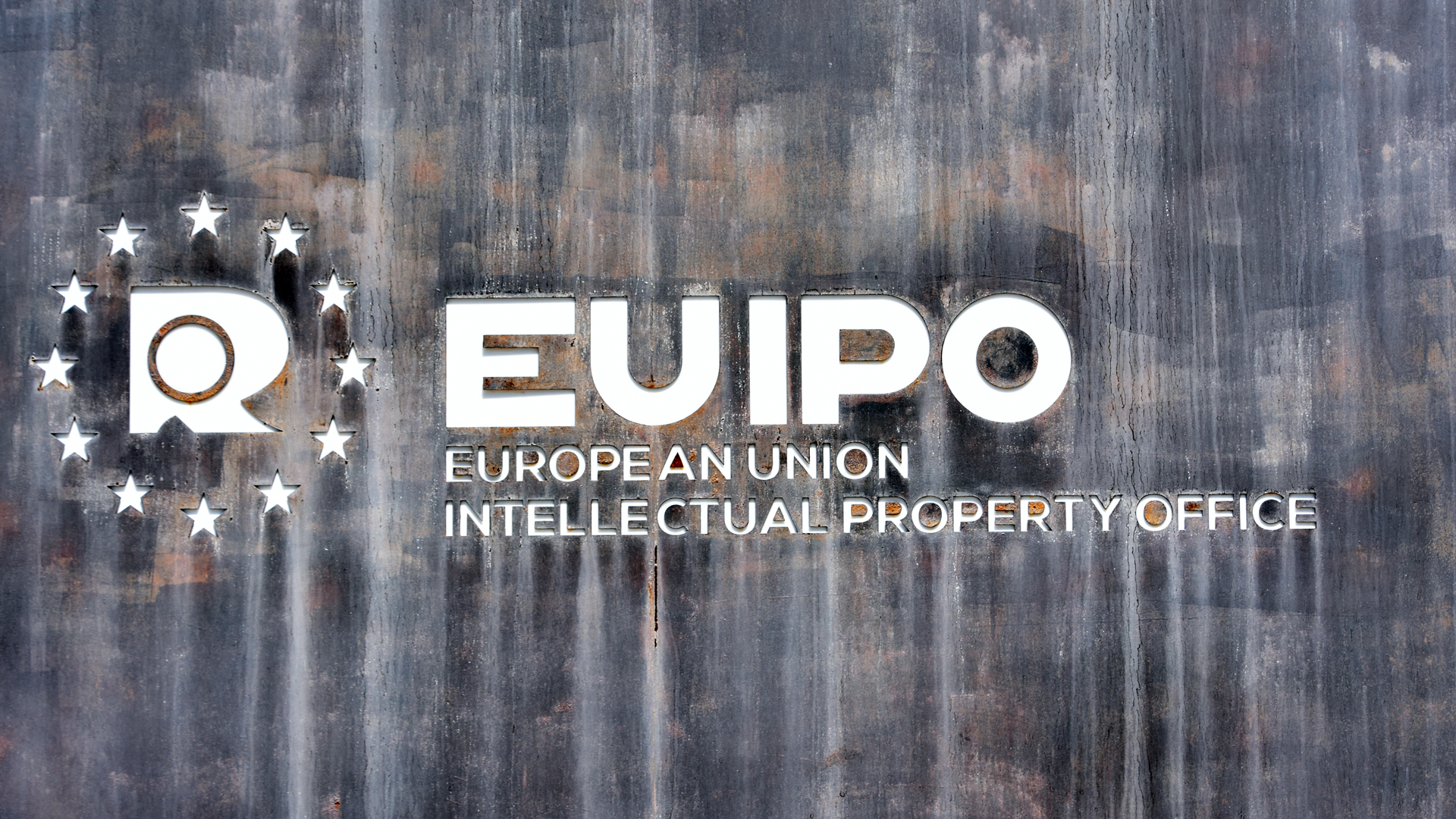 Detail of EUIPO logo inscribed on EUIPO building in Alicante, Spain, by Kristof Room CC by 2.0