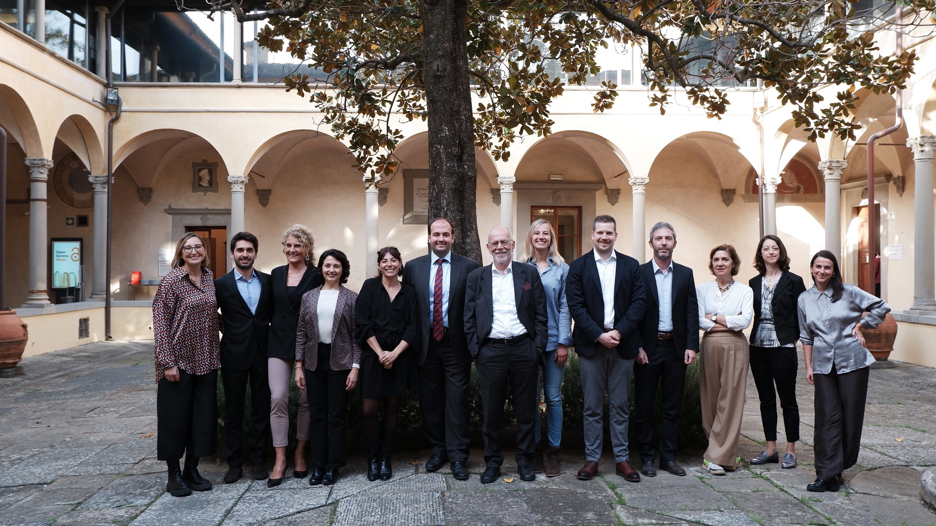 Photo of the team of the Centre for Digital Society in the upper cloister of Badia Fiesolana