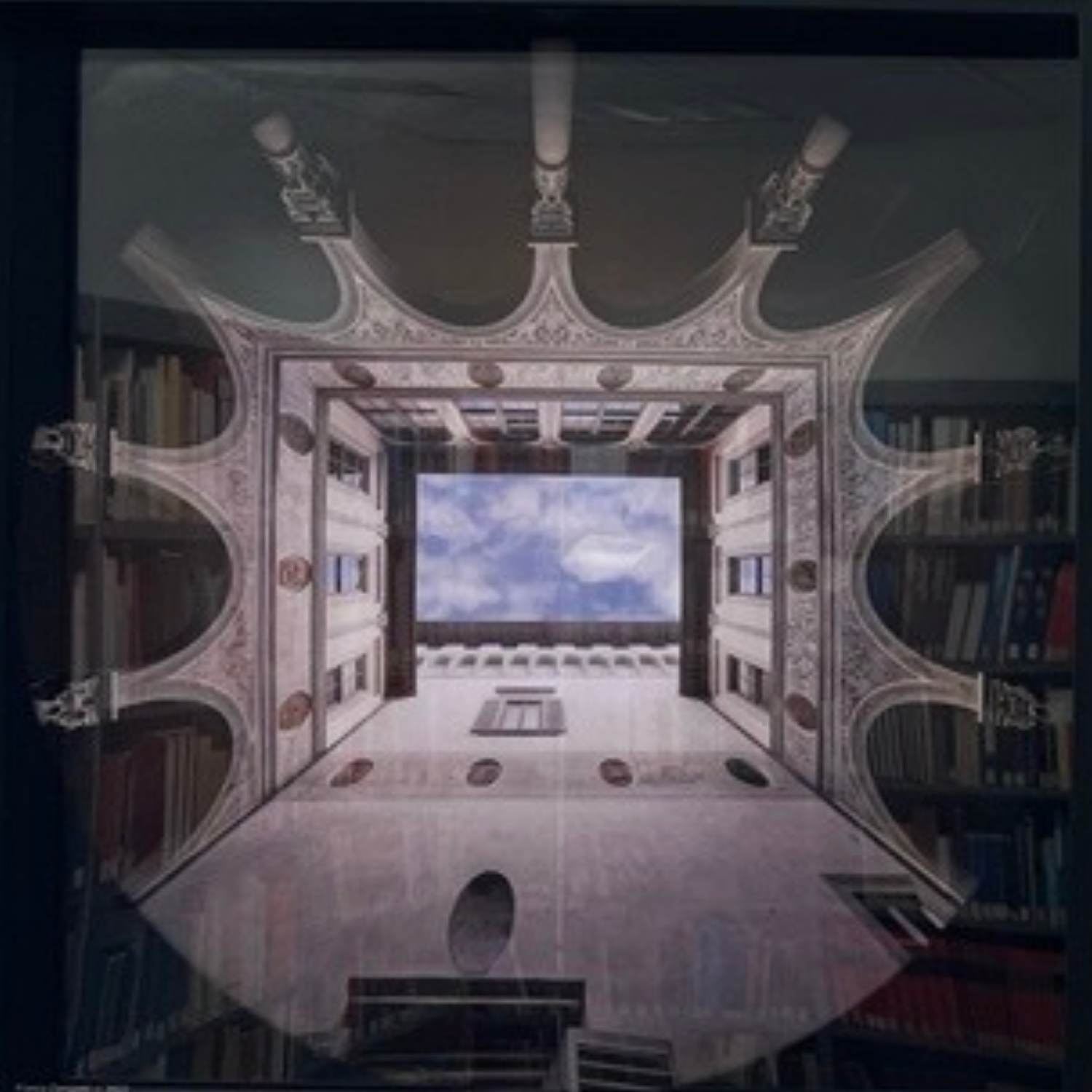 Framed photograph of an architectural courtyard displayed in the EUI Library.