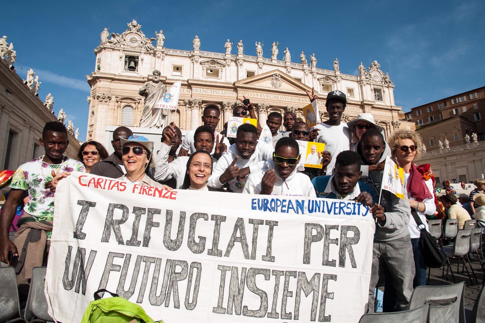 Refugees visit Rome and join the Pope on stage for audience