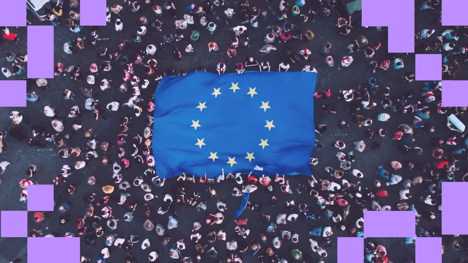 An overhead view of a large crowd gathered around a giant European Union flag. The crowd appears diverse, and the scene is framed with pixelised elements, a characteristic of the brand identity of EU&I.