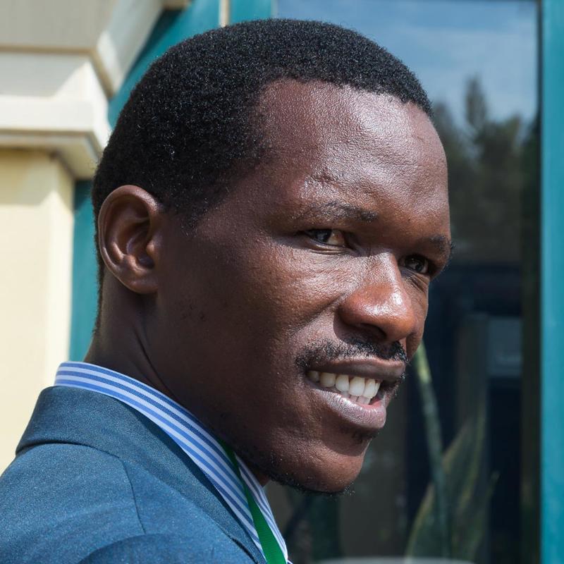 Portrait picture of Charles Obila