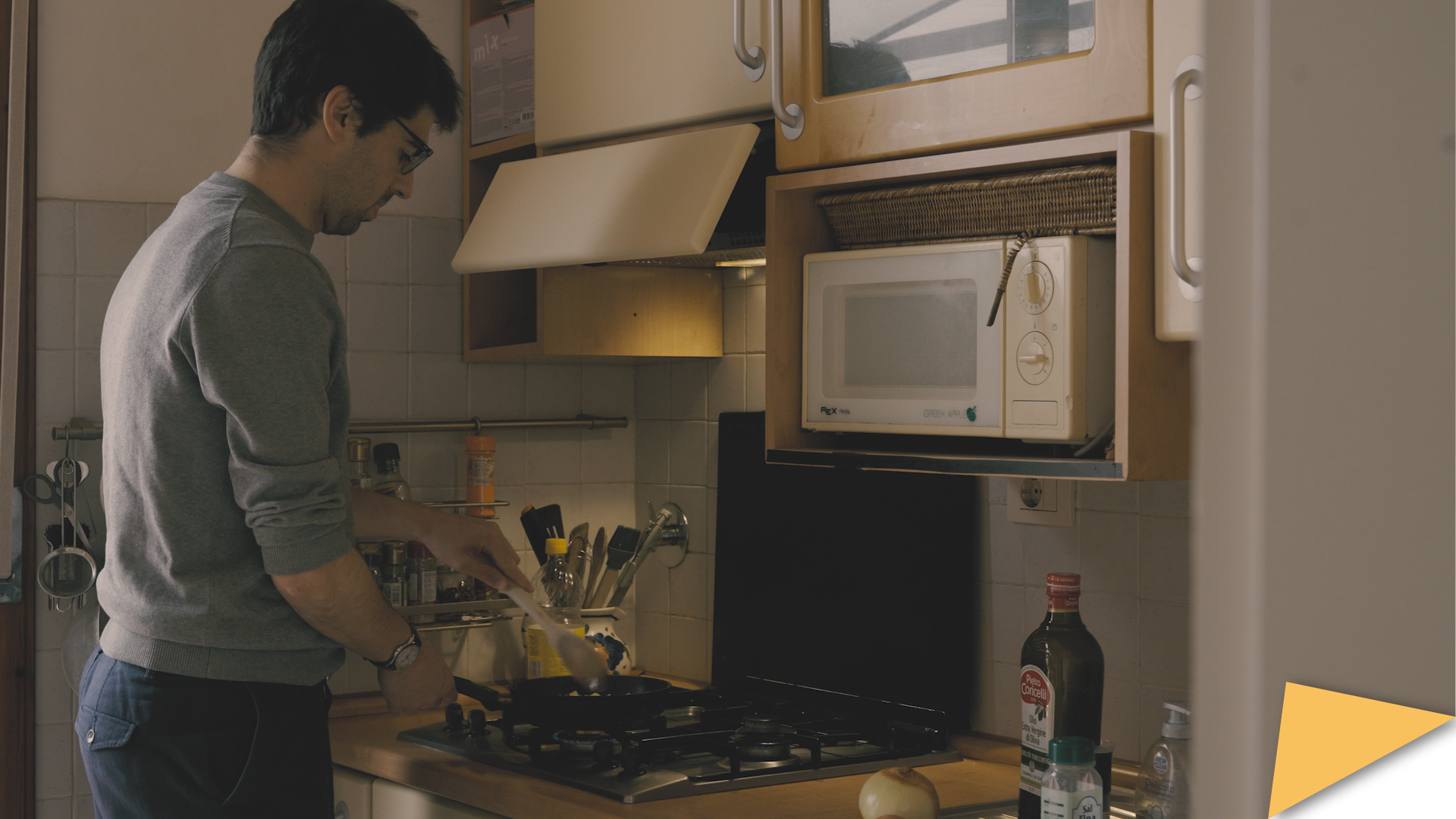 Miguel Blanco Cocho in a kitchen, cooking.