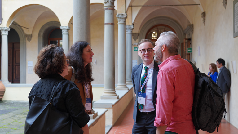 People talking in cloister