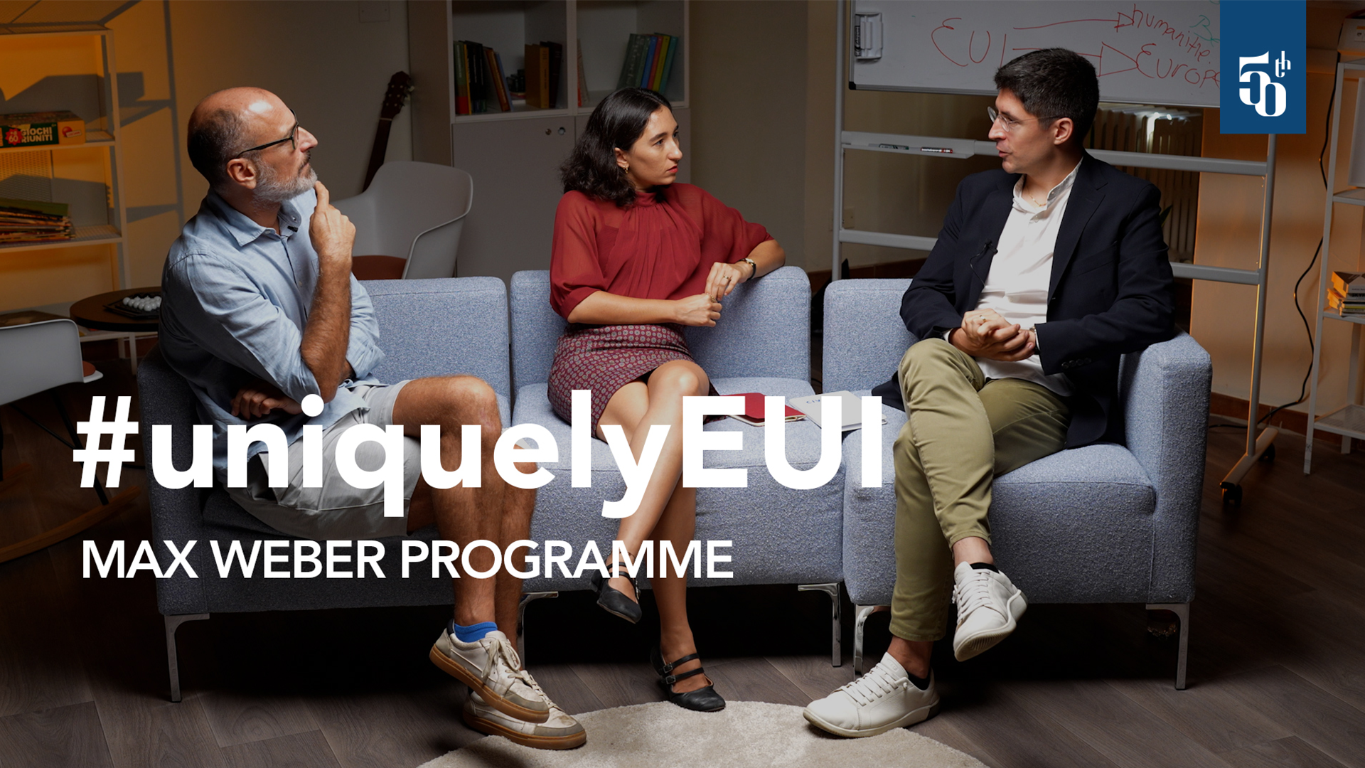 Sergio Puig, Yasemin Akçagüner, and Roberto Valli sitting together on a couch.
