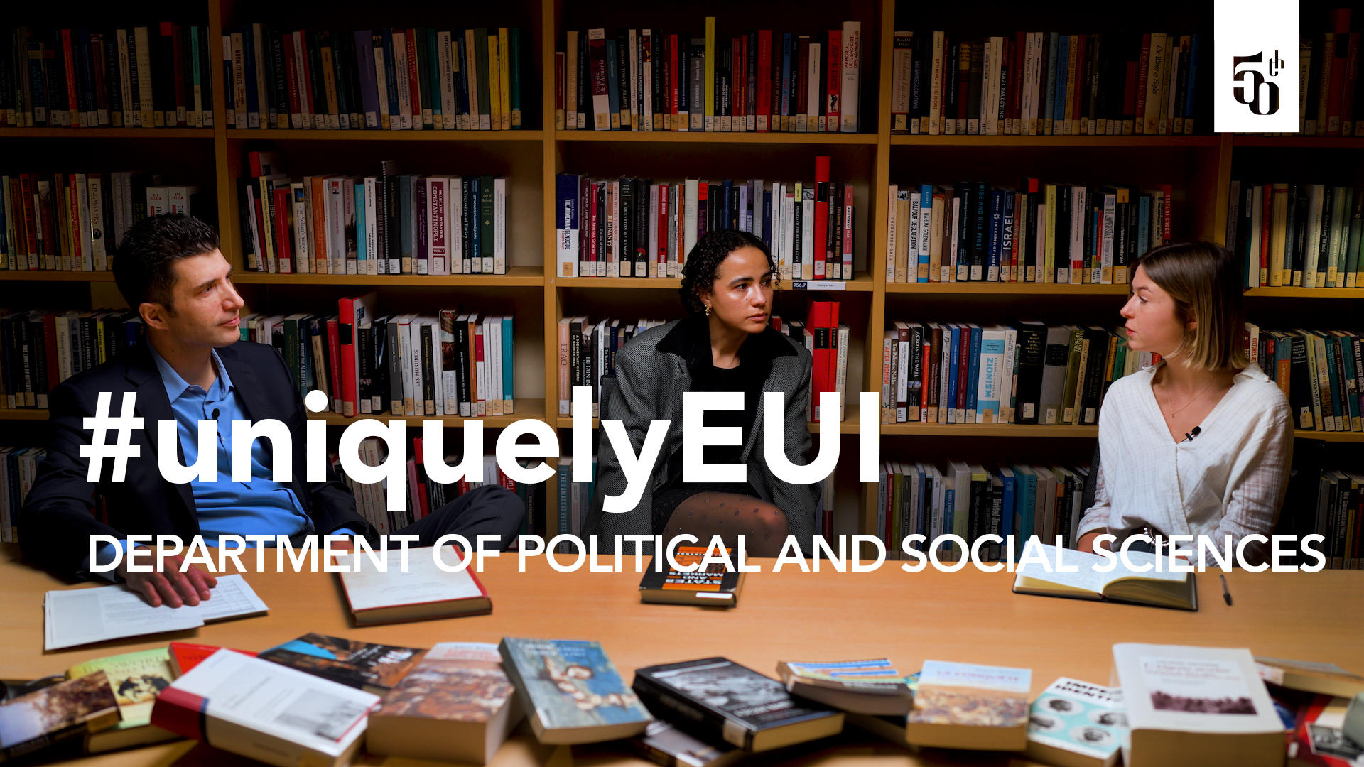 Arnout van de Rijt, Cathrine Kjaer, and Louise Dupont sitting together in a library room.