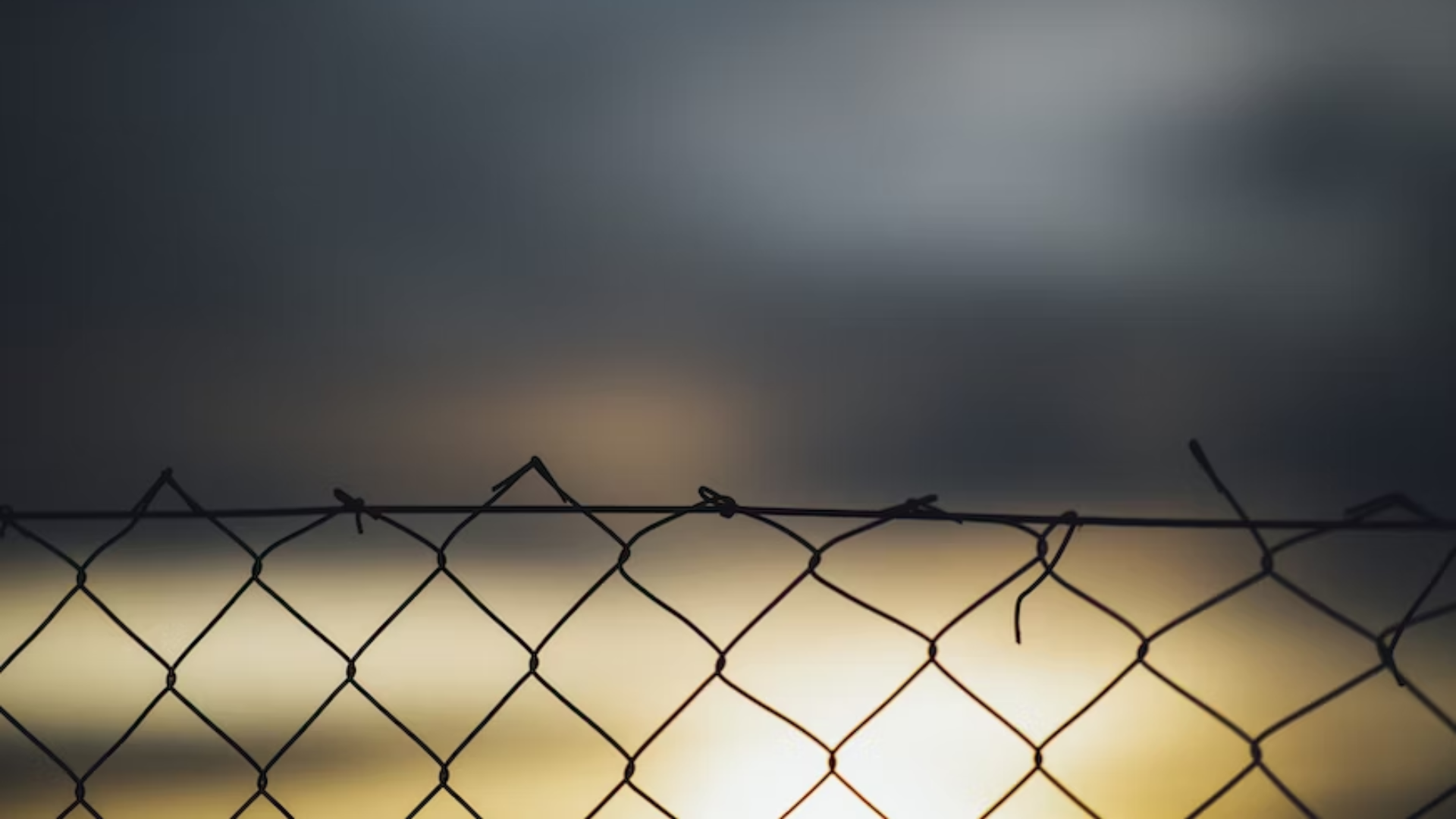 Chain fence at sundown