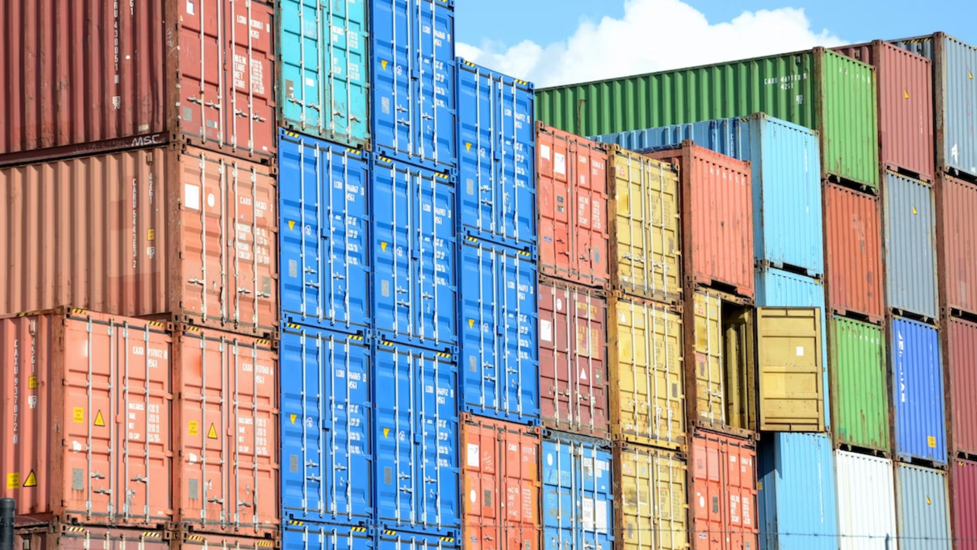 Metal trade containers of different colors in Antwerp, Belgium. Author: Paul Teysen