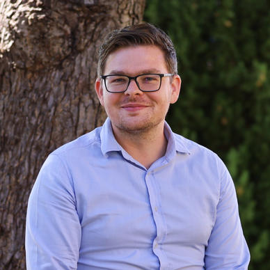 Portrait picture of Ciprian Grumaz, PhD, LAW