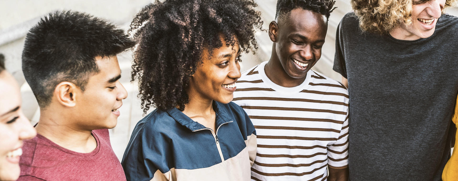 Diverse students and researchers talking and smiling