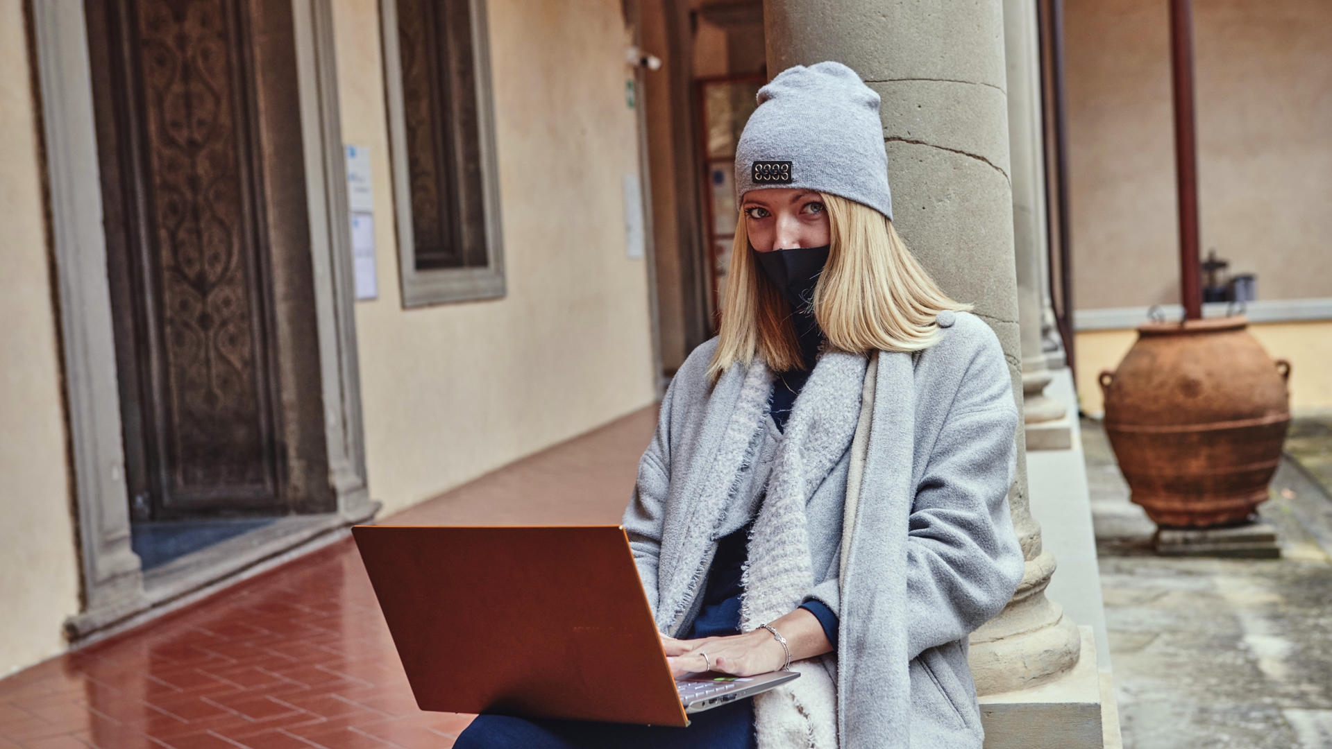 Researcher working on notebook