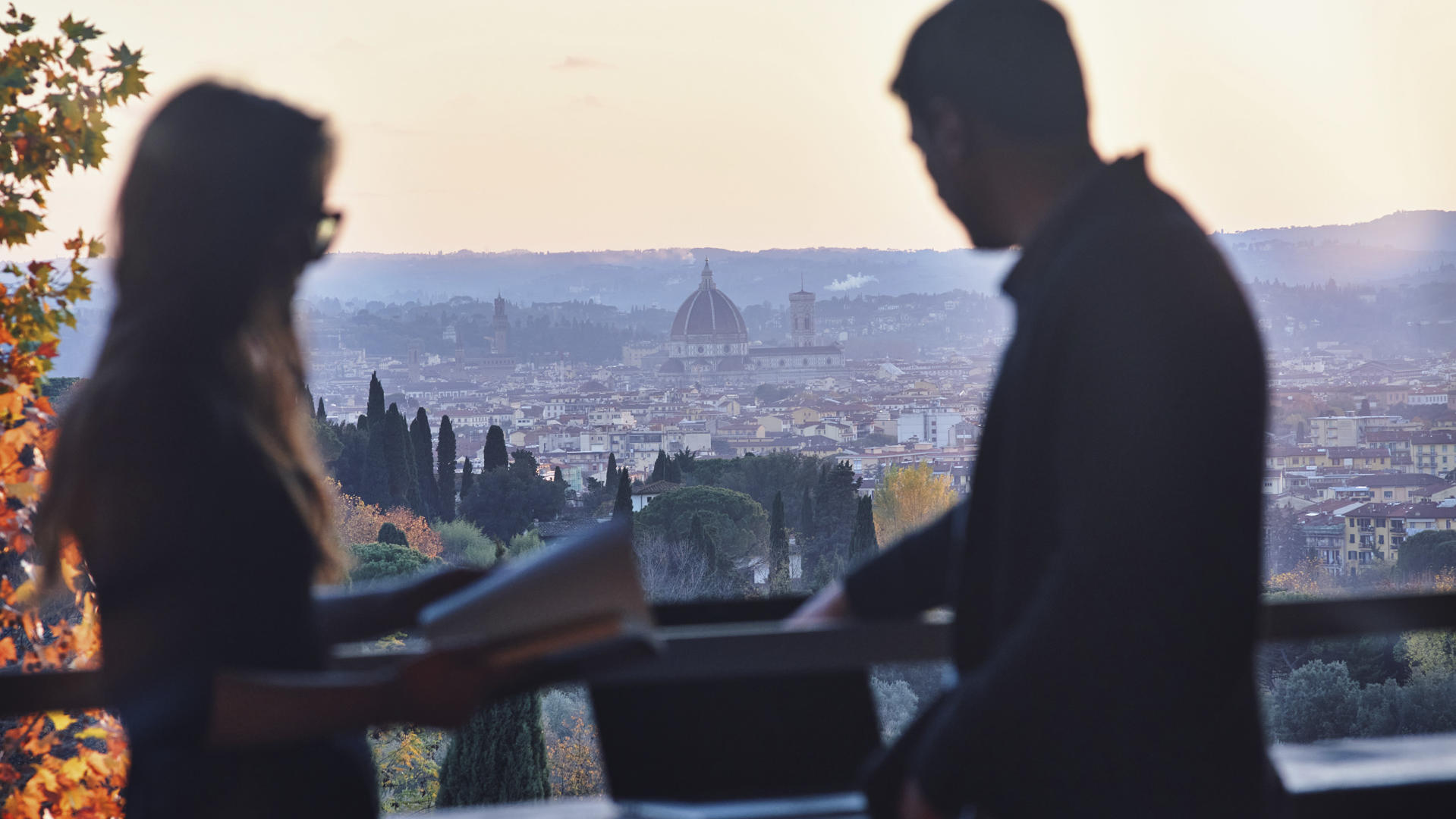Researchers in upper loggia with Florence view in the background