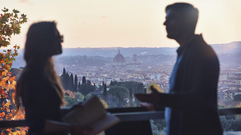 Silhouette of two researchers in upper loggia